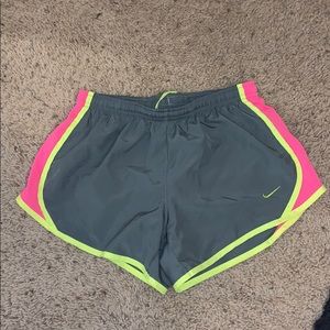 Gray and neon yellow/pink Nike shorts